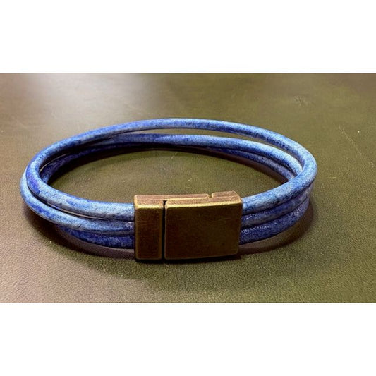 Blue three strand bracelet with a bronze clasp