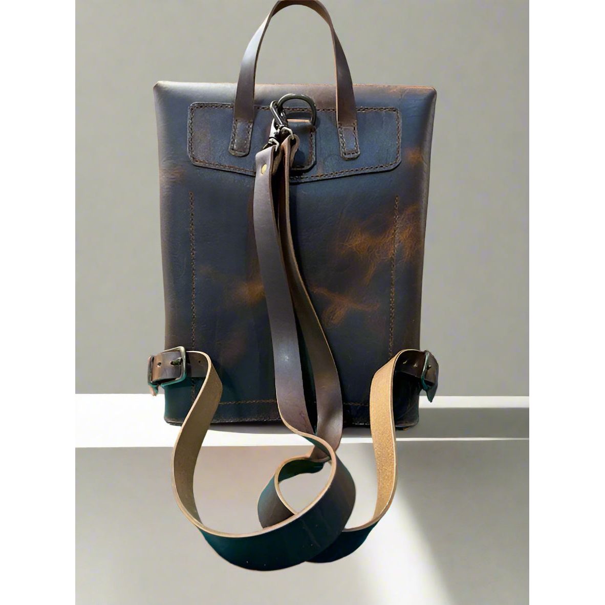 Brown leather bag with a strap 