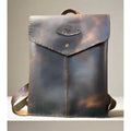 Brown leather bag with a strap 